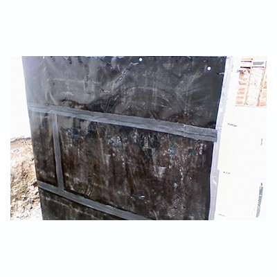 Between Slab Waterproofing Black waterproof membrane with horizontal and vertical seams applied to a surface, with adjacent white material on the right.